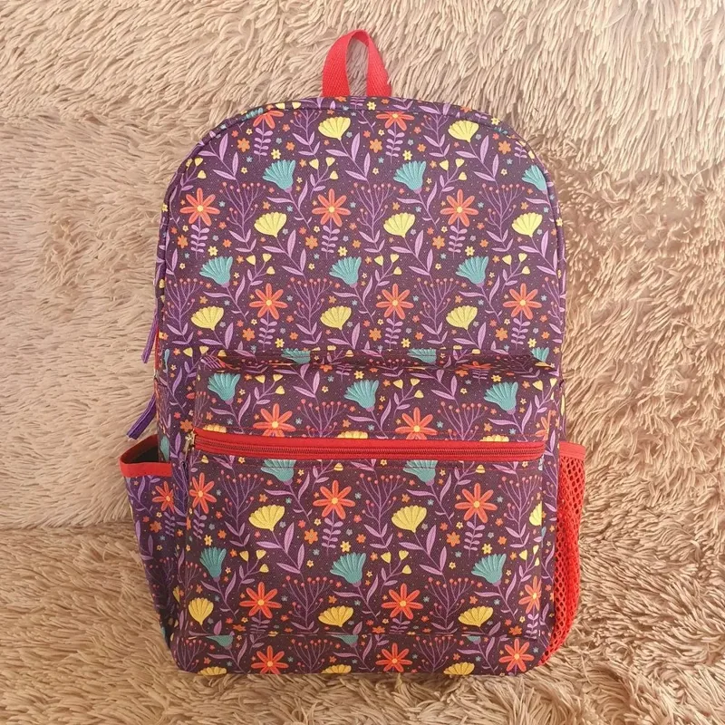 Mochila y cartuchera XL con bolsillo frontal, cordura · flores